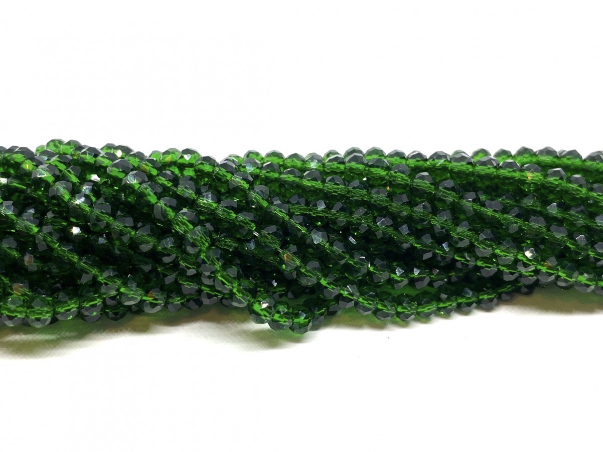 Facetslebne glasperler, klar mørk grøn 2x3mm