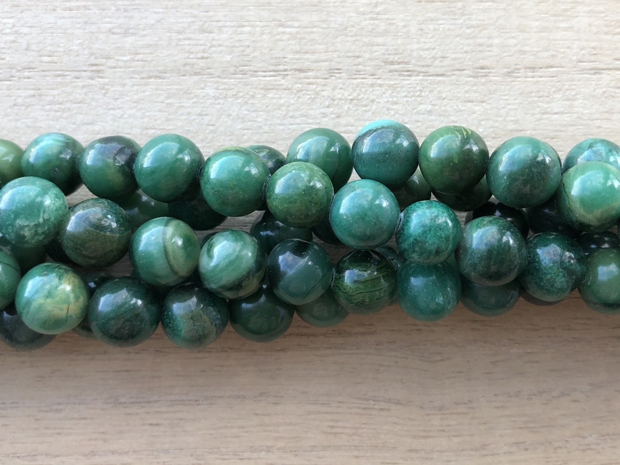Grøn Xibei jade, rund 8mm, hel streng