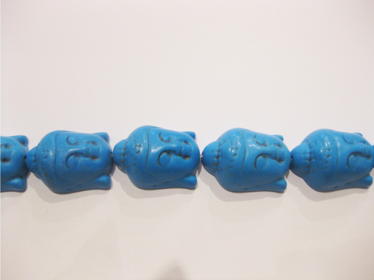 Dodger blå Buddha hoveder i syntetisk turkis 20x30mm