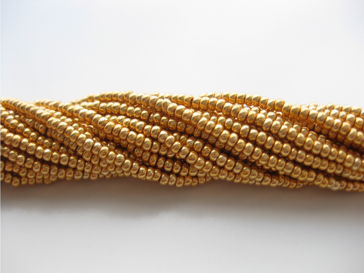 Preciosa seed beads #11 mørk metallic guld, 50cm streng