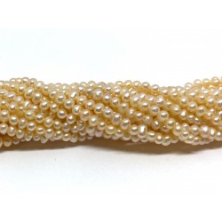 Fersken farvede ferskvandsperler, ca 2,5-3mm, hel streng